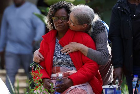 ‘I want my boy out of there’ — agonising vigil for families of those trapped in George building rubble