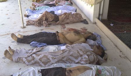 Assad's forces accused of massacre near Syrian capital