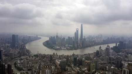 Legendary China Bets Unwind as Buffett, SoftBank Sell
