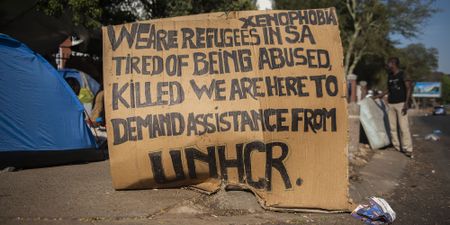Protesting foreign nationals held at repatriation centre have legal status to be in SA - Home Affairs